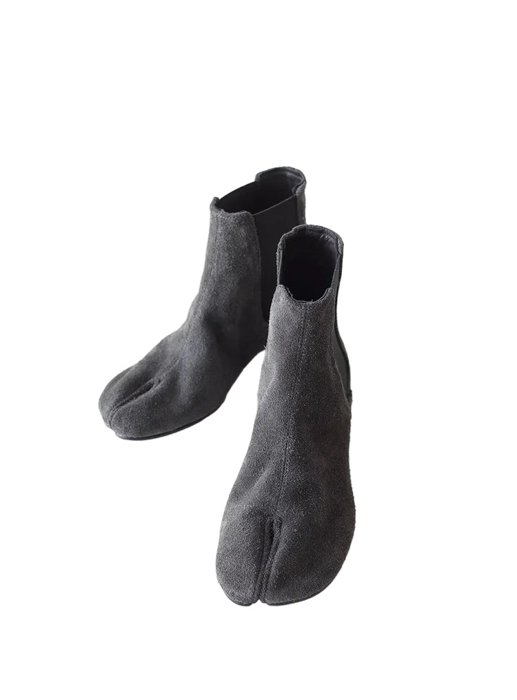 Pair of gray tabi socks on a white background