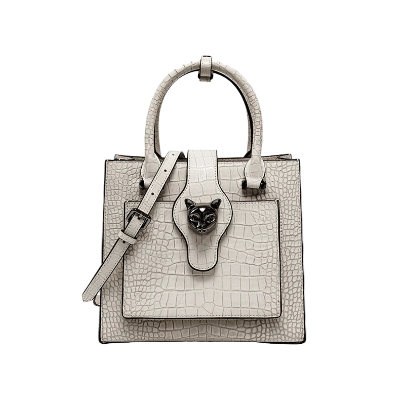 White handbag with a cat emblem on a light gray background, featuring the brand 'Bafelli'.