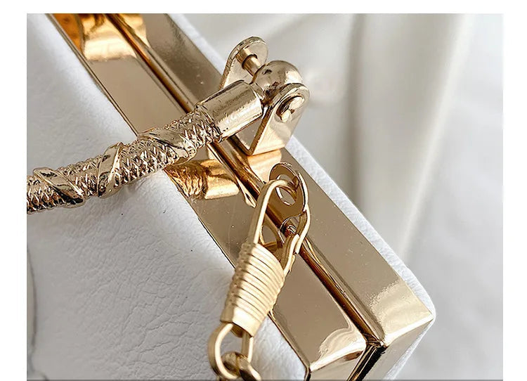 Gold hook on a white background with 'THE DETAILS SHOW' text