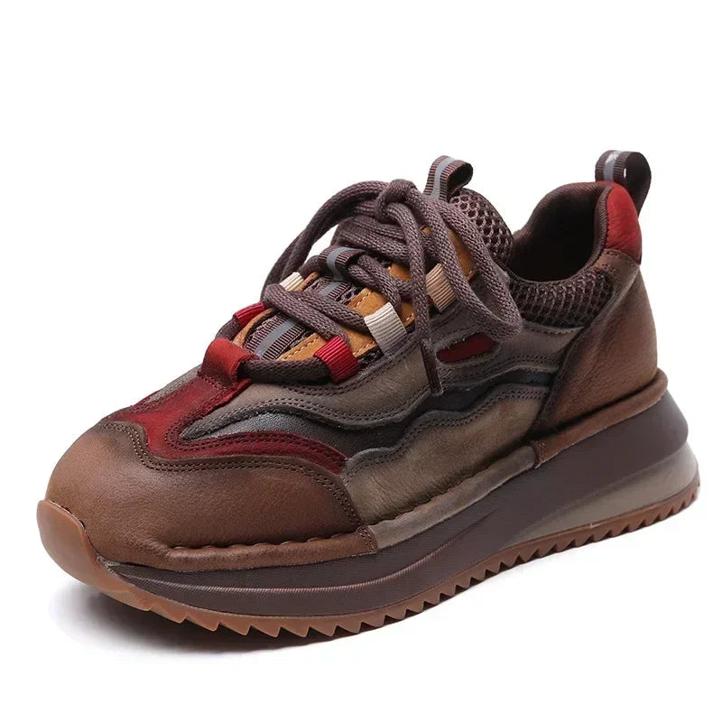 Brown and red sneaker with 'KOZNOY' branding on a white background