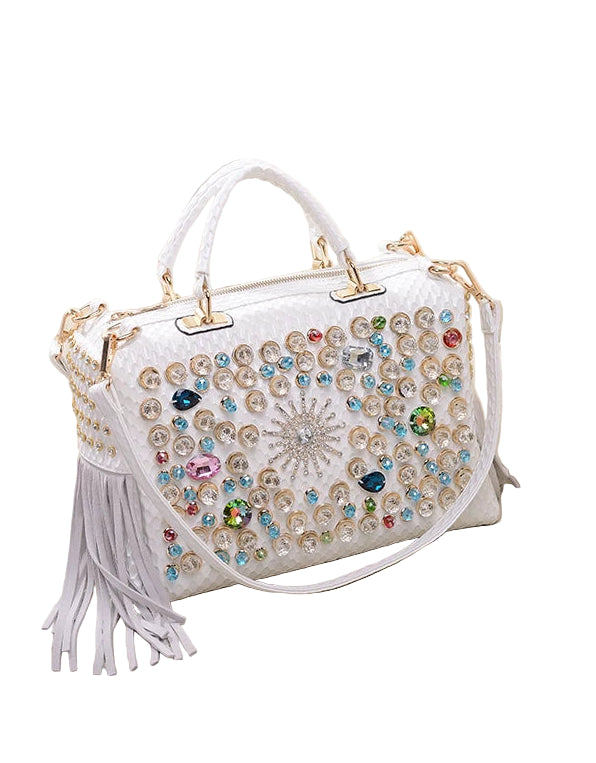 Decorative handbag with colorful embellishments on a white couch