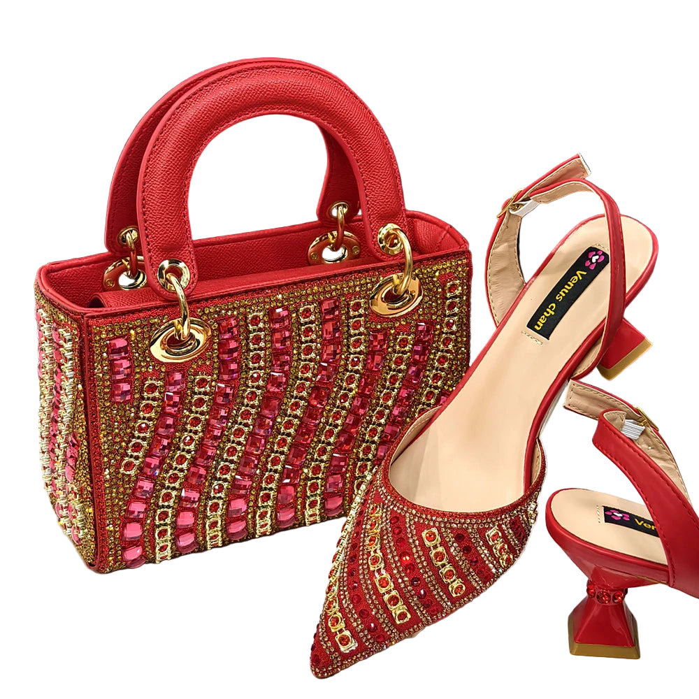 Red handbag and high-heeled shoes with gold and pink embellishments on a white background