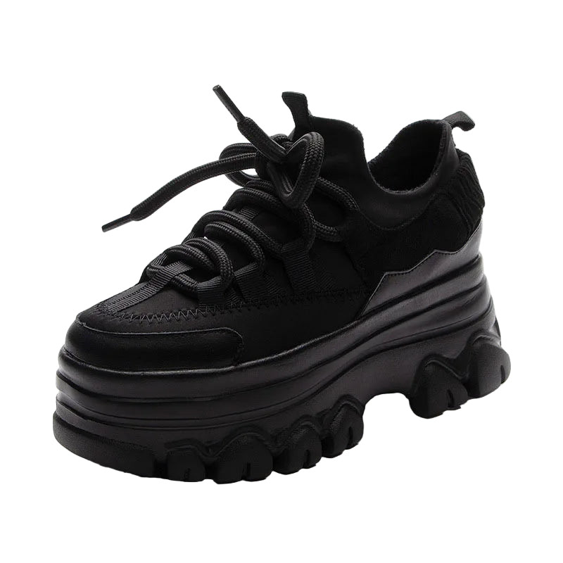 Black sneaker with thick sole on a white background, featuring the Fujin brand.