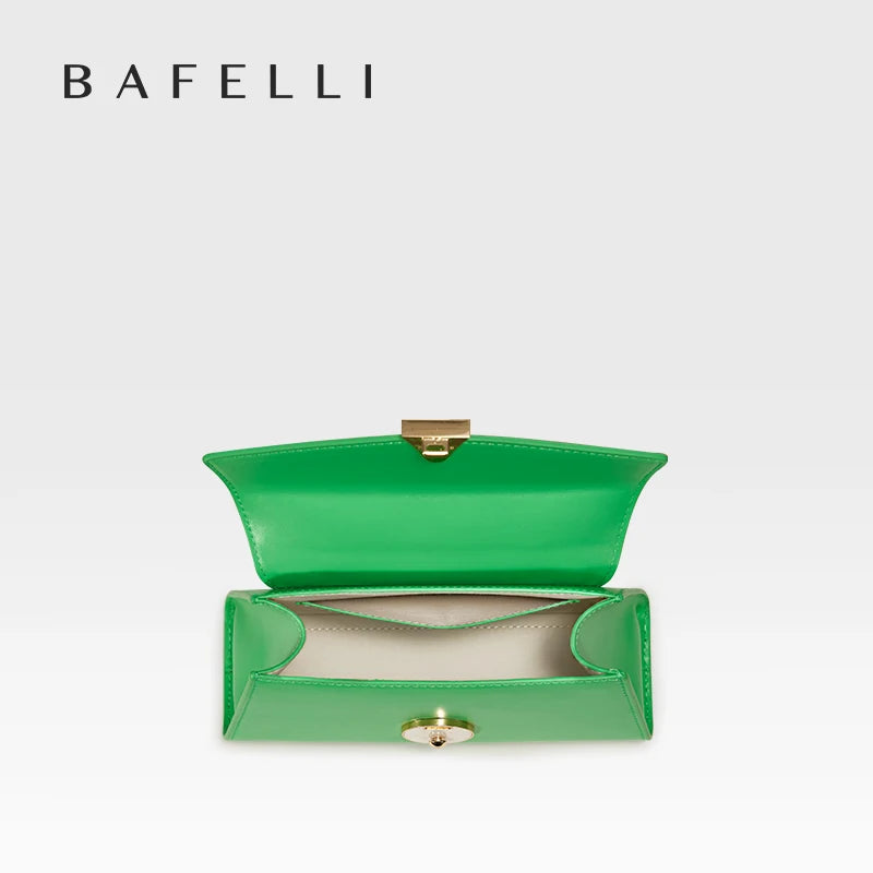 Green clutch bag with gold accents on a light gray background, featuring the brand 'Bafelli'.
