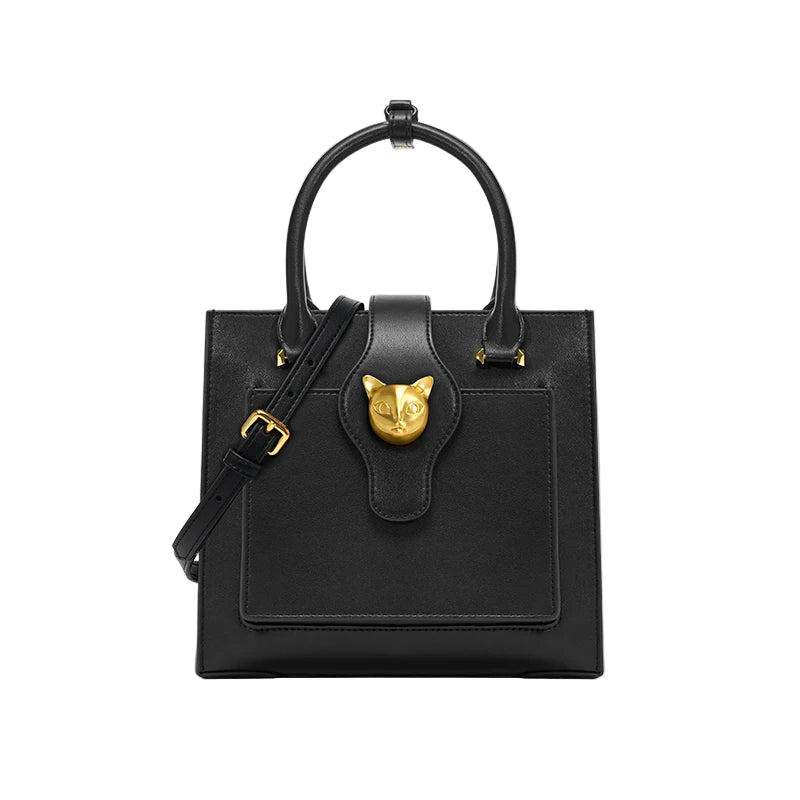 Black handbag with gold accents featuring a brand logo on a light gray background