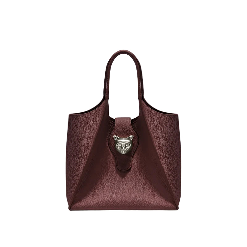 Brown handbag with a cat emblem on a light gray background, featuring the brand 'Bafelli'.